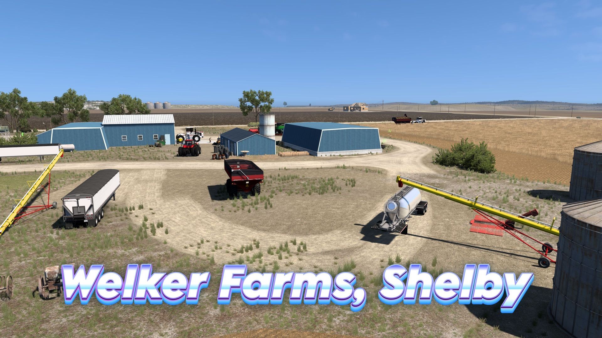 Aerial view of Welker Farms with machinery, blue buildings, and a silo in Shelby.